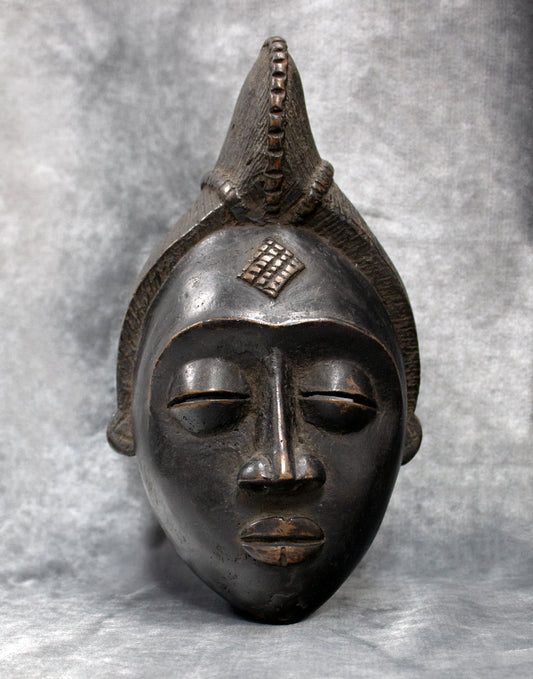 Punu, Gabon: a rare, black Punu mask